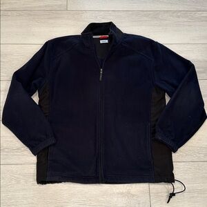 Izod Men's Navy and Black Lightweight performance sleeve  Jacket. Size XL